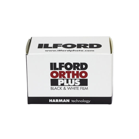 Ilford Ortho Plus black and white film packaging on a white background